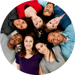 teens lying in a circle with heads together